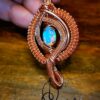 white opal ethiopië 2.1carat copper wire