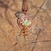 hanger met tesla coil en houder voor bloemen of kruiden