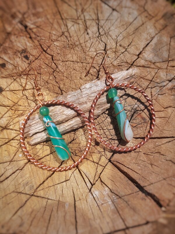 oorbellen met 1/4 sacret cubit tensor ring met groene agaat